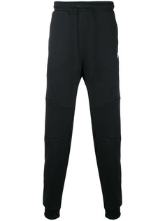 Nike зауженные к низу брюки