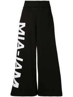Mia-Iam logo print wide leg trousers