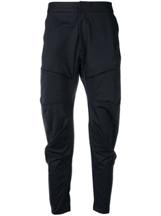 Nike брюки с карманами-карго Tech Pack