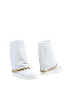 Полусапоги и высокие ботинки Casadei