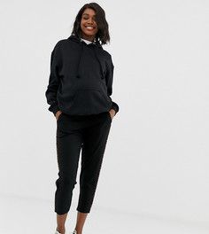 Трикотажные брюки со звериным принтом ASOS DESIGN Maternity - Черный