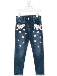 Monnalisa джинсы узкого кроя с нашивками в виде цветов