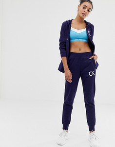 Синие спортивные штаны Calvin Klein Performance - Синий