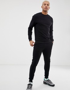 Черный спортивный костюм в рубчик из свитшота и зауженных джоггеров ASOS DESIGN - Черный