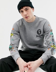 Серый свитер с принтом на рукавах AAPE By A Bathing Ape X Steven Harrington - Серый