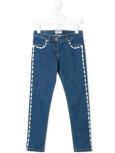 Moschino Kids джинсы скинни с эффектом краски