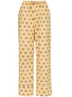 Toteme Natal printed high-waisted drawstring trousers