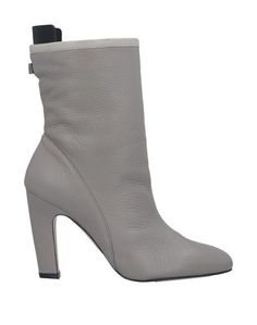 Полусапоги и высокие ботинки Stuart Weitzman