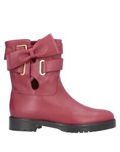 Полусапоги и высокие ботинки Valentino