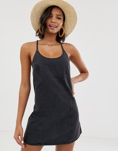Черный джинсовый сарафан с завязкой сзади ASOS DESIGN - Черный