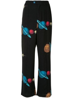 Undercover planet print trousers