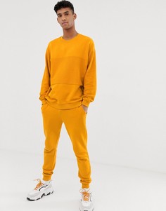 Желтый спортивный костюм со свитшотом и джоггерами ASOS DESIGN - Желтый