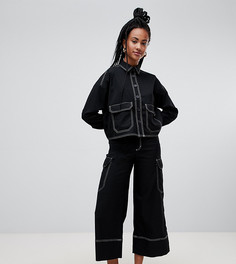 Черные широкие брюки с карманами карго и контрастными строчками Monki - Черный