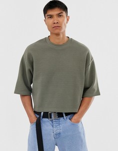 Укороченный свободный свитшот цвета хаки в рубчик с короткими рукавами ASOS DESIGN - Зеленый