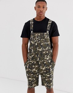 Узкий джинсовый комбинезон-шорты с камуфляжным принтом ASOS DESIGN - Зеленый