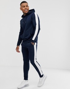 Спортивный костюм темно-синего цвета с худи и полосой по бокам ASOS DESIGN - Темно-синий