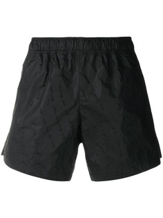 Off-White arrow stitch track shorts