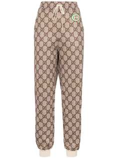 Gucci спортивные брюки с узором GG Supreme