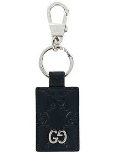 Gucci фирменный фактурный брелок