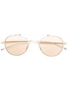 Thom Browne Eyewear затемненные солнцезащитные очки в круглой оправе