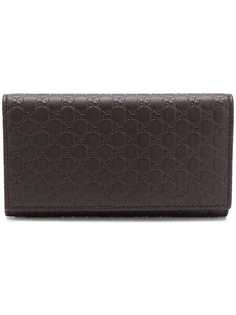 Gucci кошелек с узором Gucci Signature
