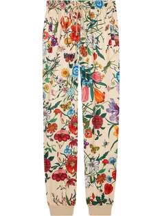 Gucci спортивные брюки с принтом Flora