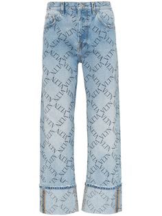 Valentino джинсы с логотипами и подворотами