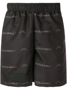 A-COLD-WALL* бермуды с принтом логотипа