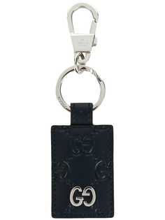 Gucci фирменный фактурный брелок