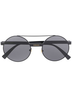 Versace Eyewear солнцезащитные очки в круглой оправе