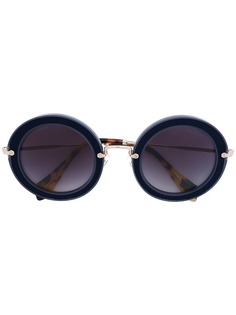 Miu Miu Eyewear круглые солнцезащитные очки Noir