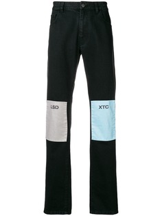 Raf Simons джинсы с нашивками на коленях
