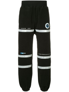 Undercover спортивные брюки с заплаткой Astronautics Agency