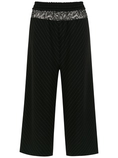 À La Garçonne striped trousers