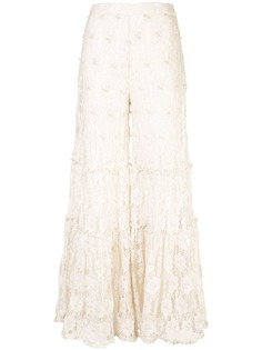 Alexis расклешенные кружевные брюки с декором