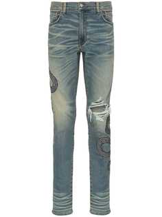 Amiri джинсы с вышивкой и рваными деталями