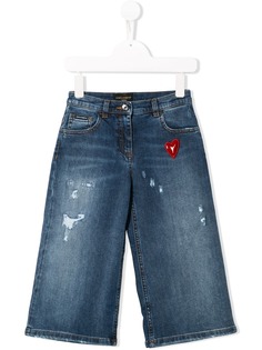 Dolce & Gabbana Kids джинсы с эффектом потертости и нашивкой