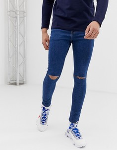 Синие джинсы с рваными коленями ASOS DESIGN - Синий