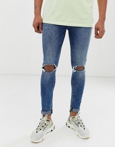 Темно-синие супероблегающие джинсы с рваными коленями ASOS DESIGN - Синий