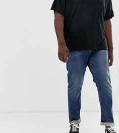 Темно-синие выбеленные узкие джинсы ASOS DESIGN Plus - Синий