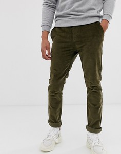 Вельветовые зауженные брюки темного цвета хаки ASOS DESIGN - Зеленый