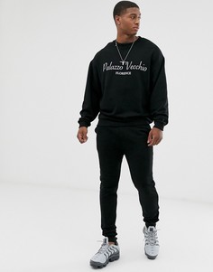 Свободный спортивный костюм черного цвета с принтом на груди ASOS DESIGN - Черный