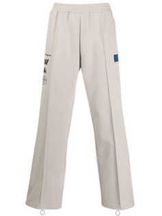 Off-White спортивные брюки с логотипом на лампасах