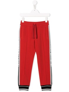Dolce & Gabbana Kids спортивные брюки с логотипом на лампасах