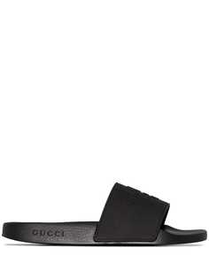 Gucci шлепанцы Pursuit с тисненым логотипом