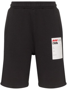 Heron Preston brand label track shorts