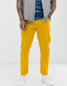 Желтые джинсы классического кроя из жесткого материала ASOS DESIGN - Желтый