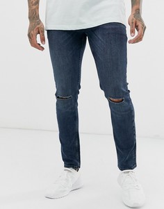 Сине-черные зауженные джинсы с прорехами на коленях ASOS DESIGN - Синий