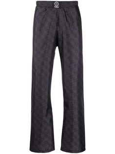 Sss World Corp all over logo print track pants