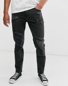 Черные выбеленные суженные книзу джинсы из денима плотностью 12,5 унции с рваной отделкой ASOS DESIGN - Черный